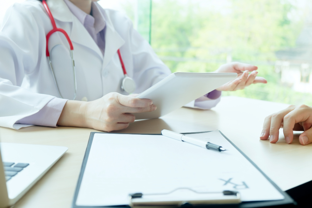 doctor-patient-are-discussing-something-just-hands-table