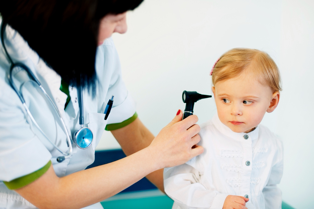 pediatrician-doing-ear-exam-baby-girl